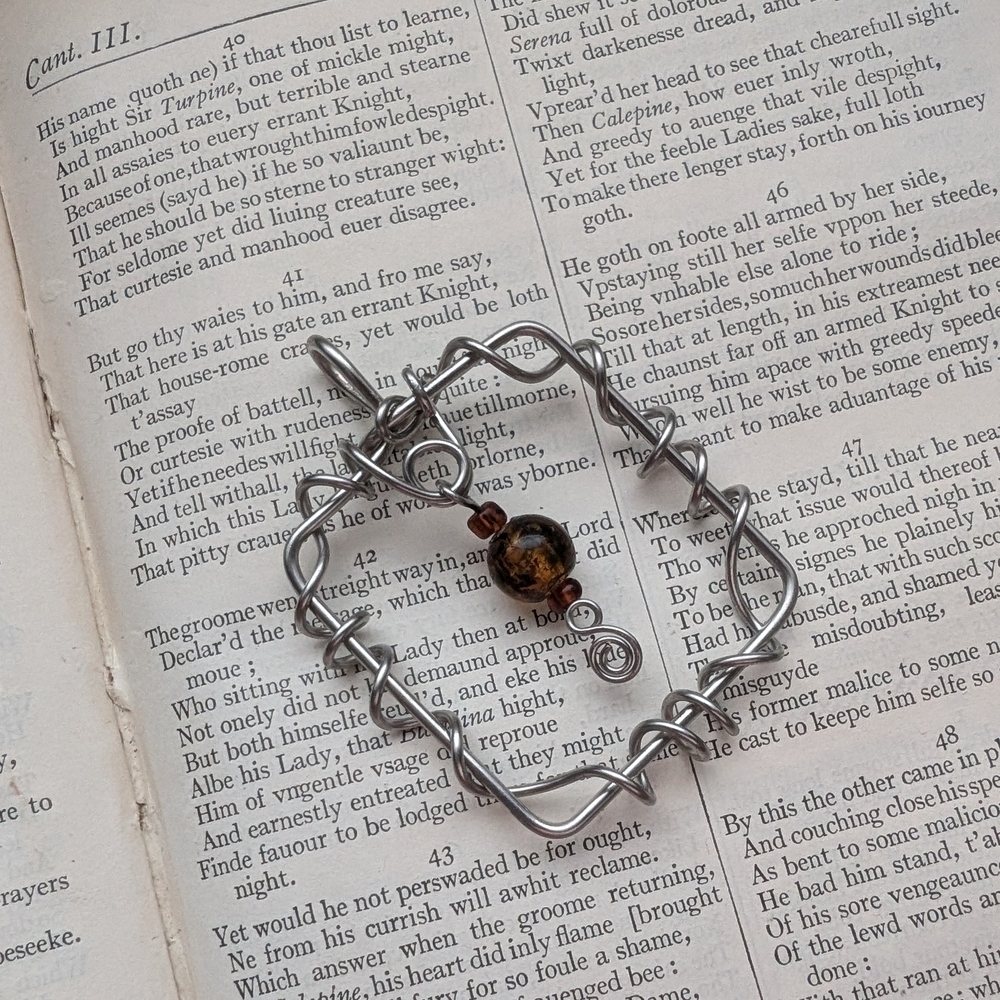 Handcrafted Wire Pendant with Bead Accent
